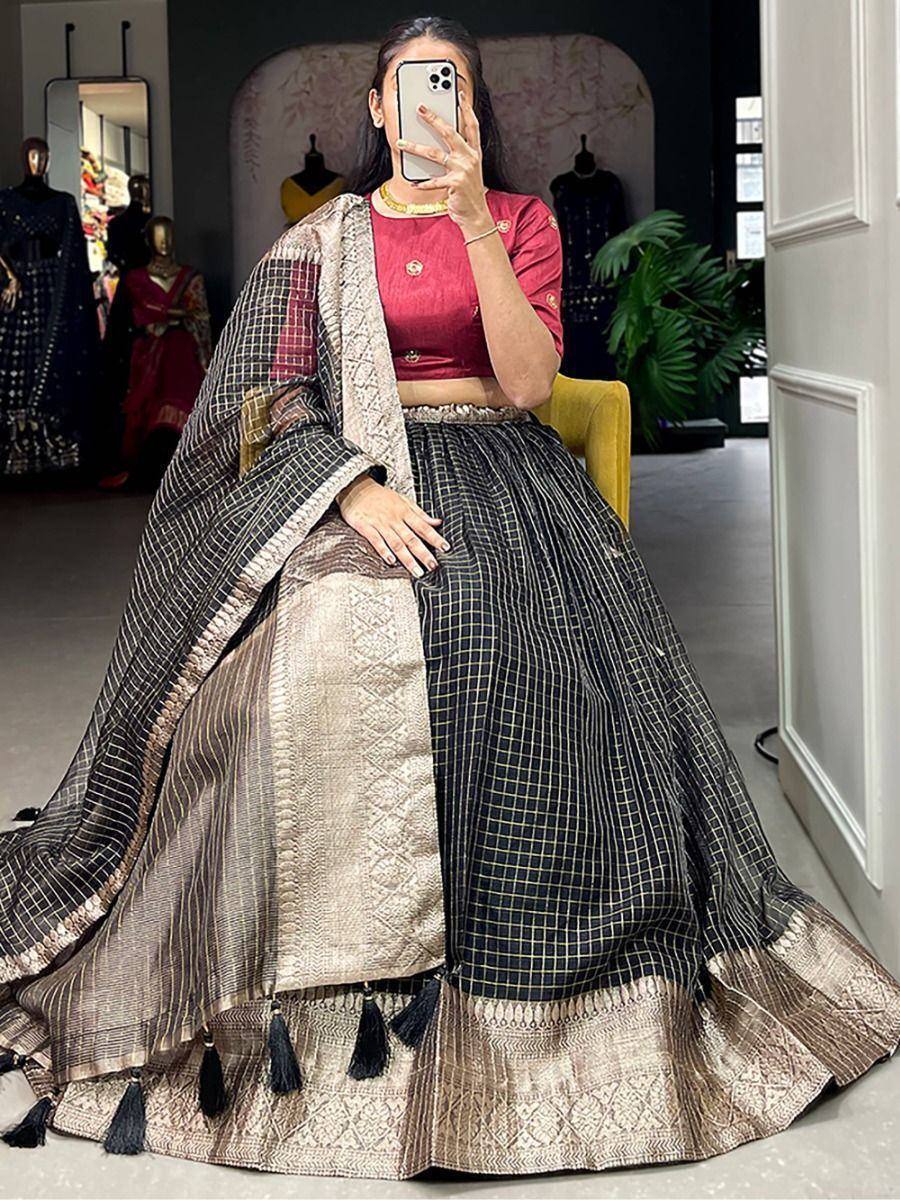 Black and gold checkered lehenga choli with tassels, perfect for Indian ethnic wear occasions