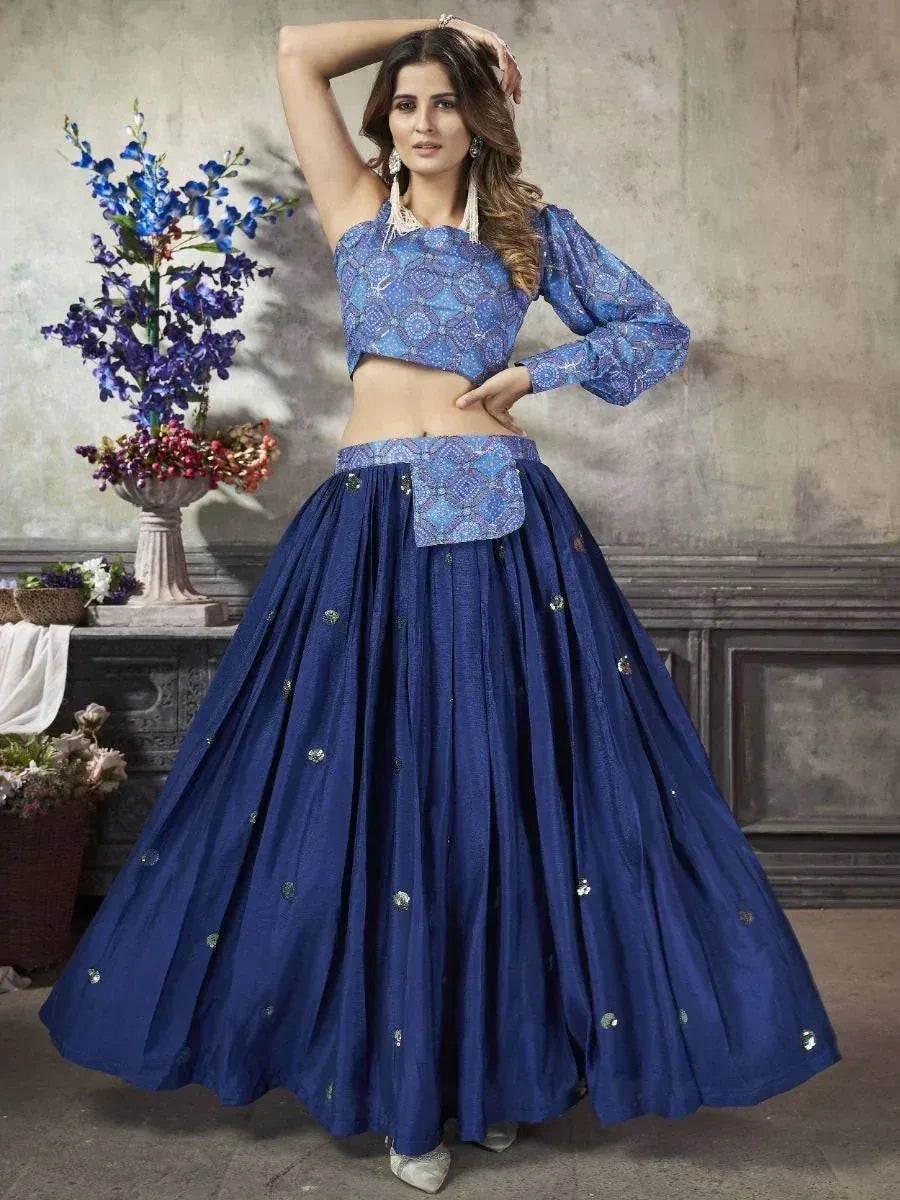Blue ethnic lehenga choli with printed crop top and embellished skirt, perfect for Indian festive occasions