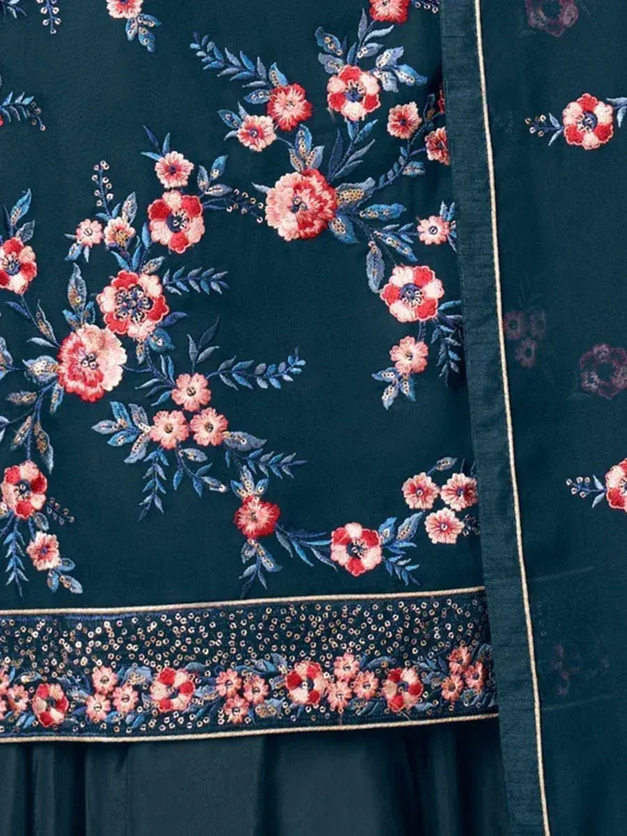 Navy blue ethnic fabric with pink floral embroidery and sequin border detailing
