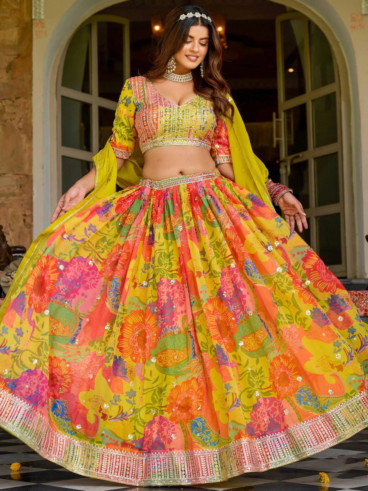 Vibrant floral lehenga choli with embroidered blouse and dupatta, perfect for Indian ethnic occasions