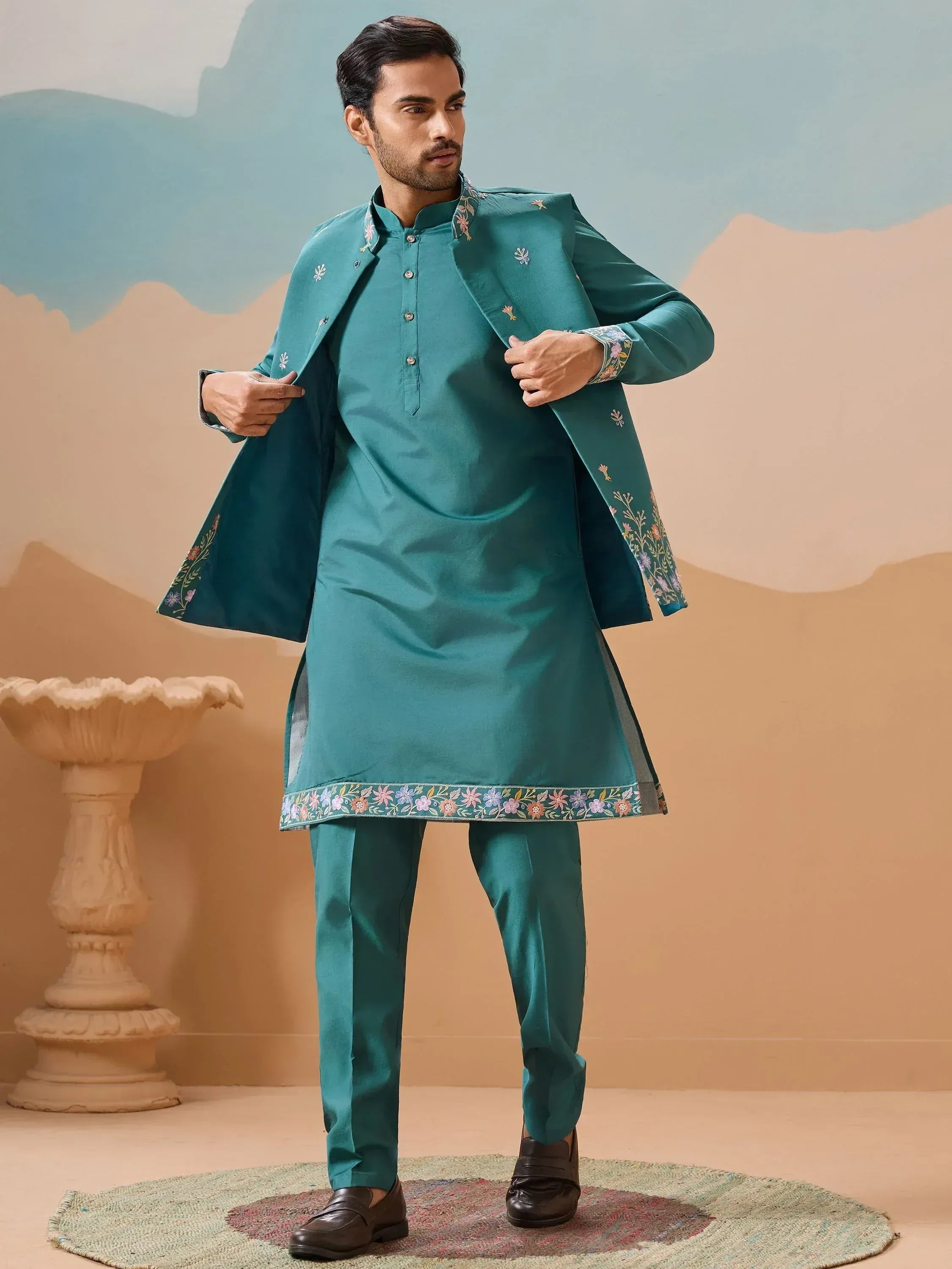 Teal embroidered kurta set with floral detailing for men's ethnic wear