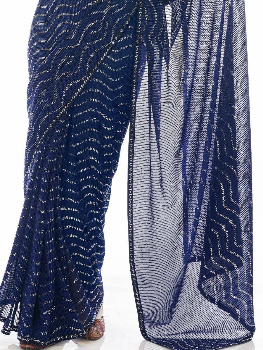 Navy blue pleated saree with silver wave embroidery and sheer border, ethnic wear for women