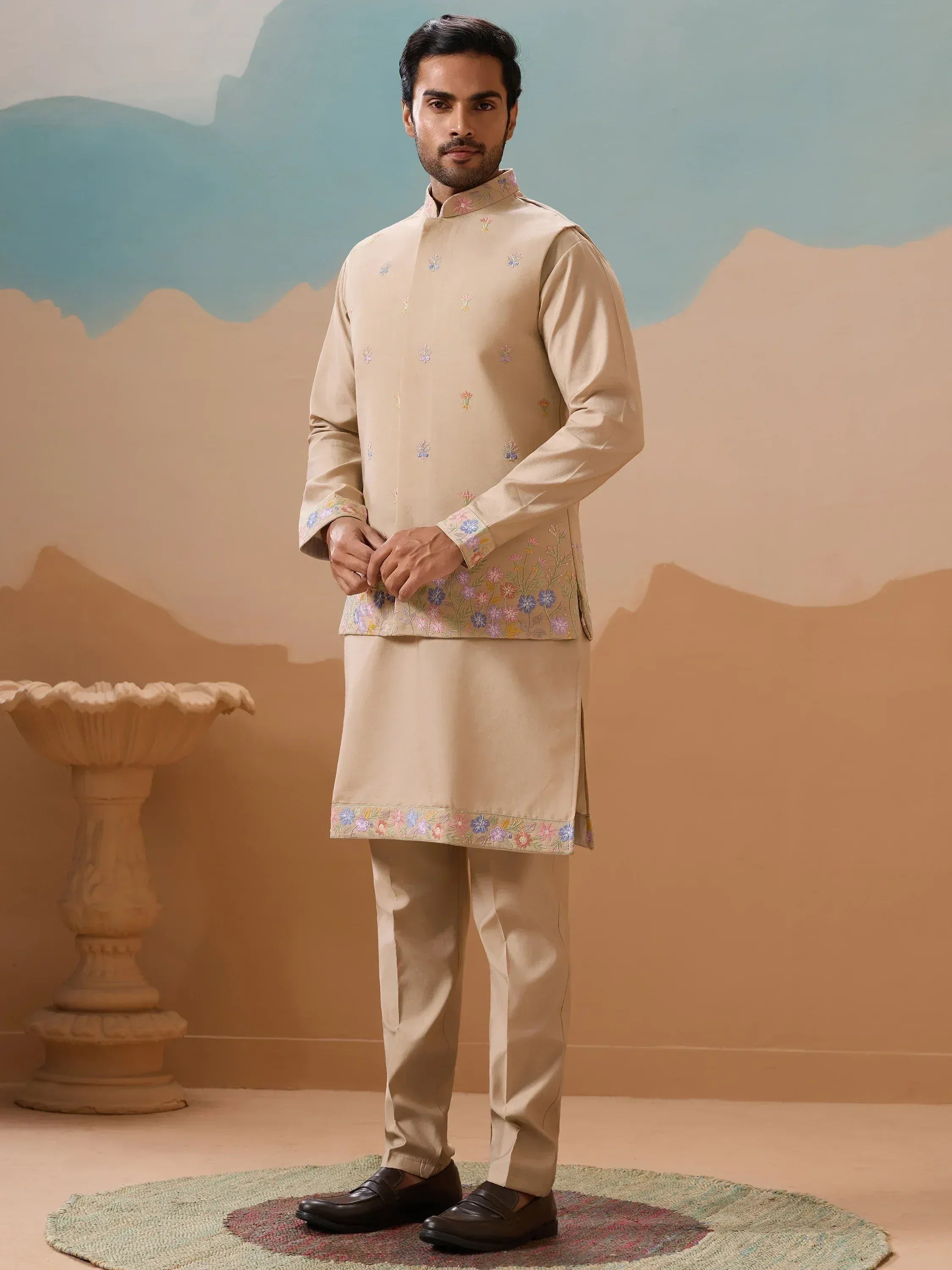 Beige embroidered kurta set with floral details, perfect for Indian ethnic wear occasions