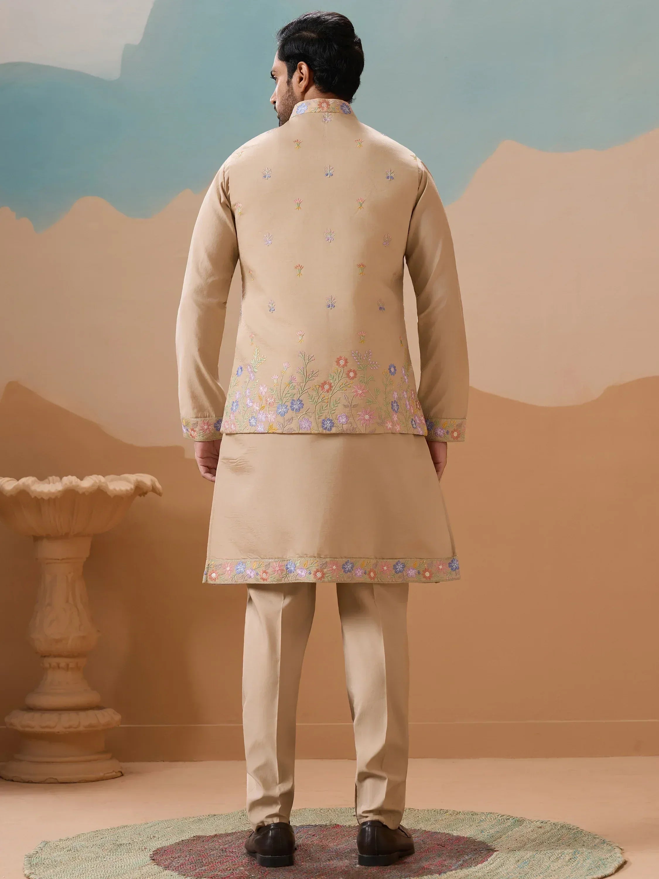 Beige embroidered kurta set with floral motifs, ideal for Indian ethnic occasions and weddings