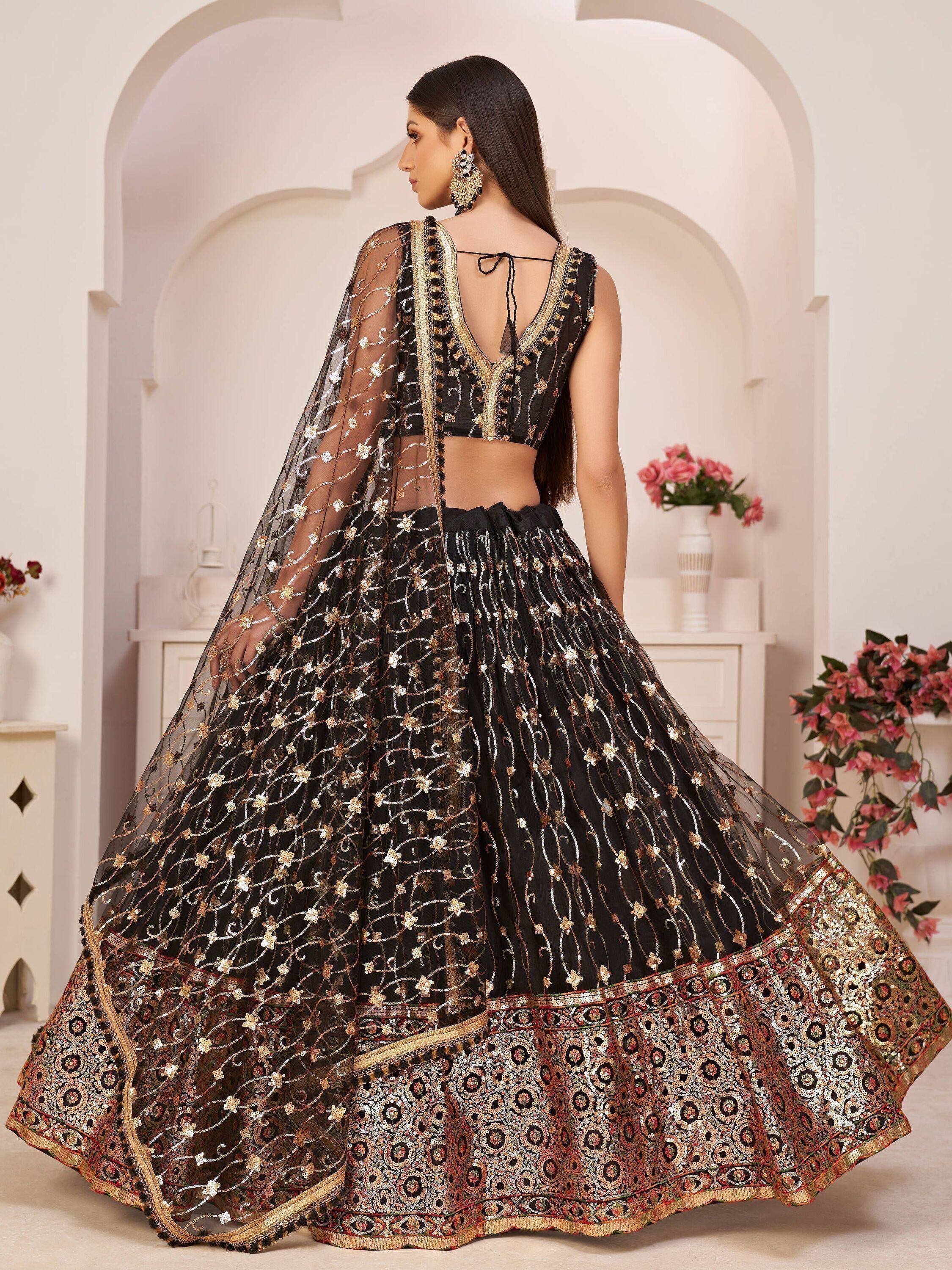 Black and gold embroidered lehenga choli with sheer dupatta, Indian ethnic wear for weddings and parties