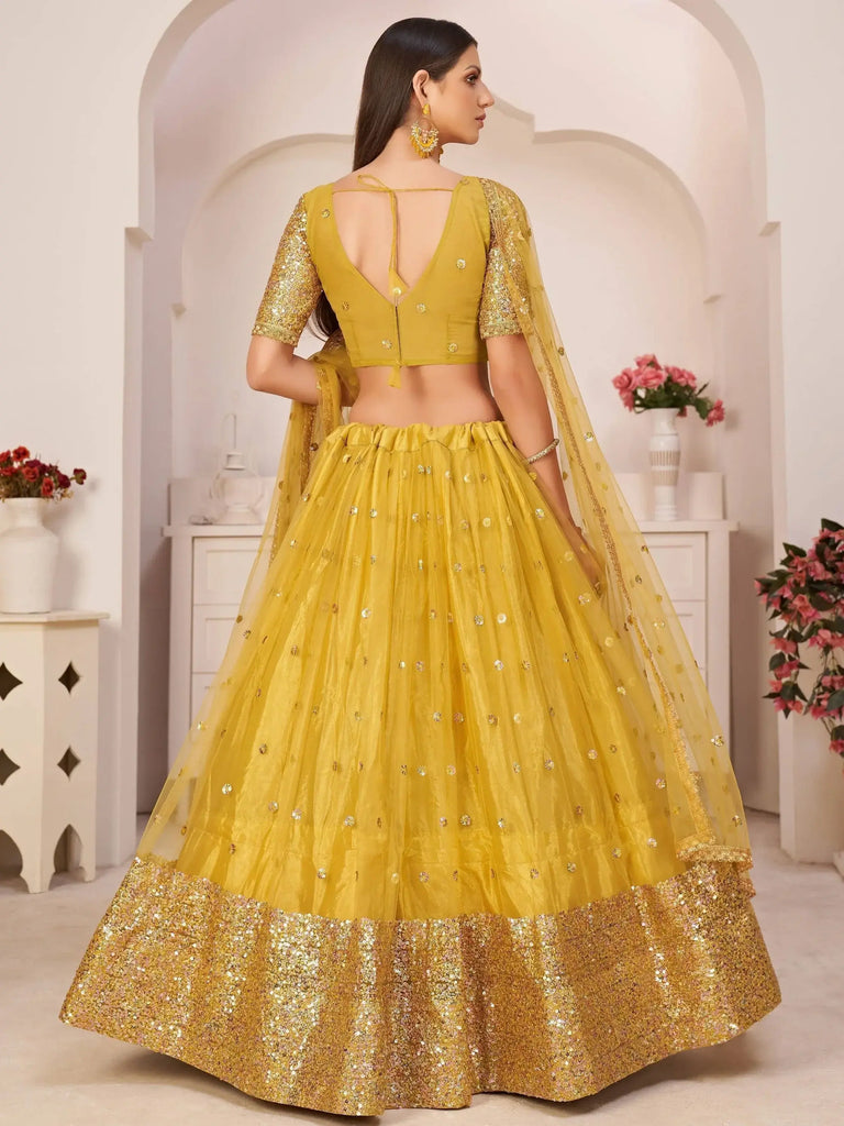 Gorgeous Light Yellow Sequins Net Party Wear Lehenga Choli