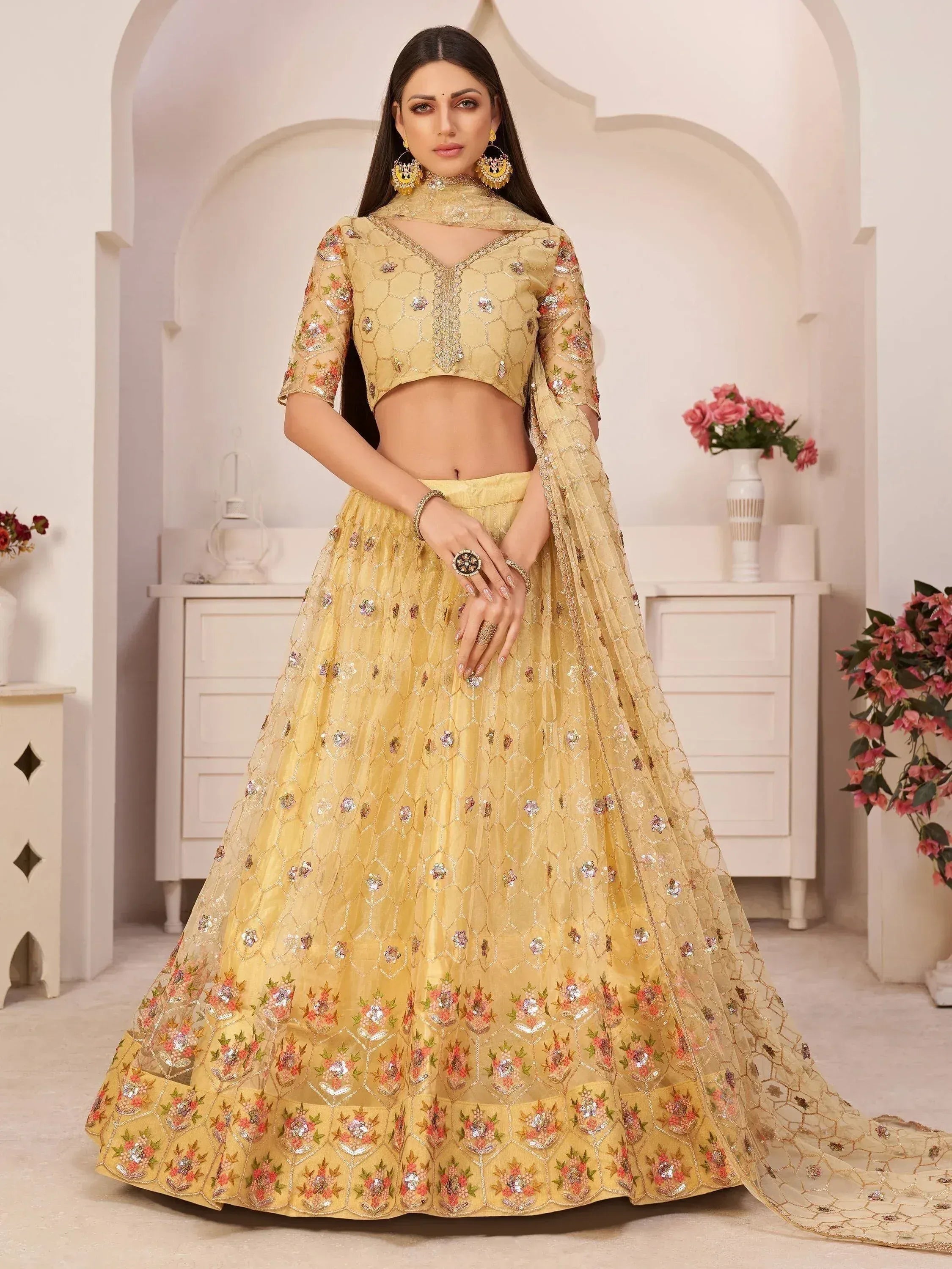 Yellow floral embroidered lehenga choli with net dupatta, Indian ethnic wear for weddings