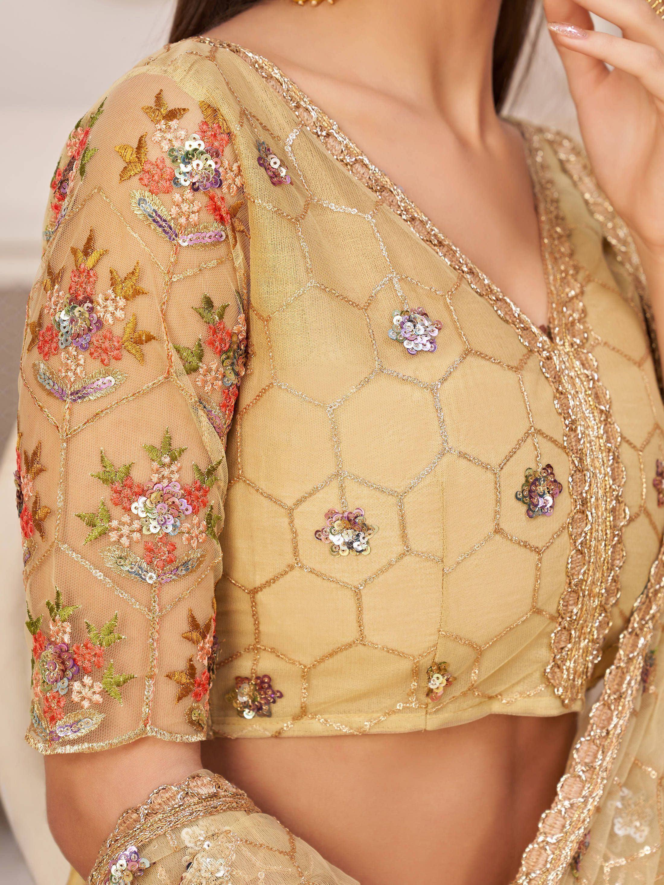 Gold ethnic blouse with floral embroidery and sequin detailing for Indian wear
