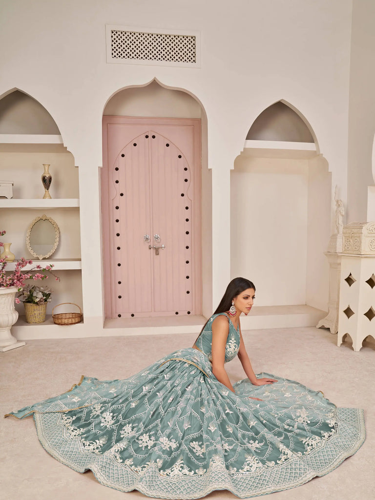 Attractive Sea-Blue Thread Embroidered Net Lehenga Choli