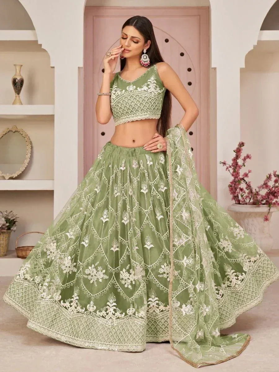 Green embroidered lehenga choli with floral motifs, perfect for Indian ethnic wear occasions