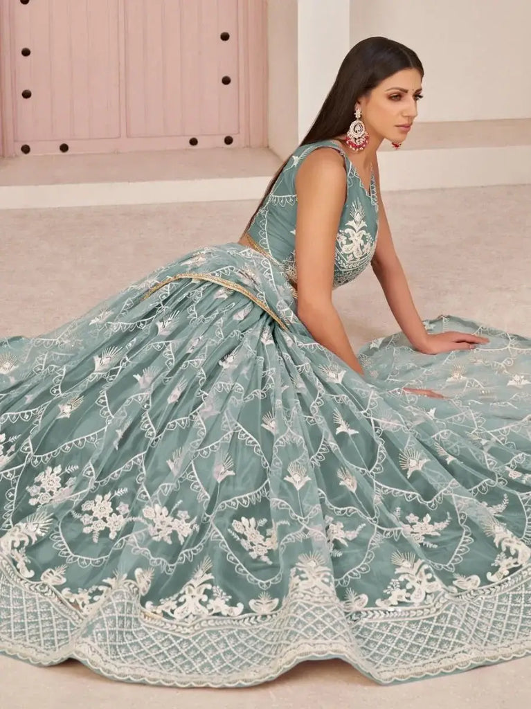 Attractive Sea-Blue Thread Embroidered Net Lehenga Choli