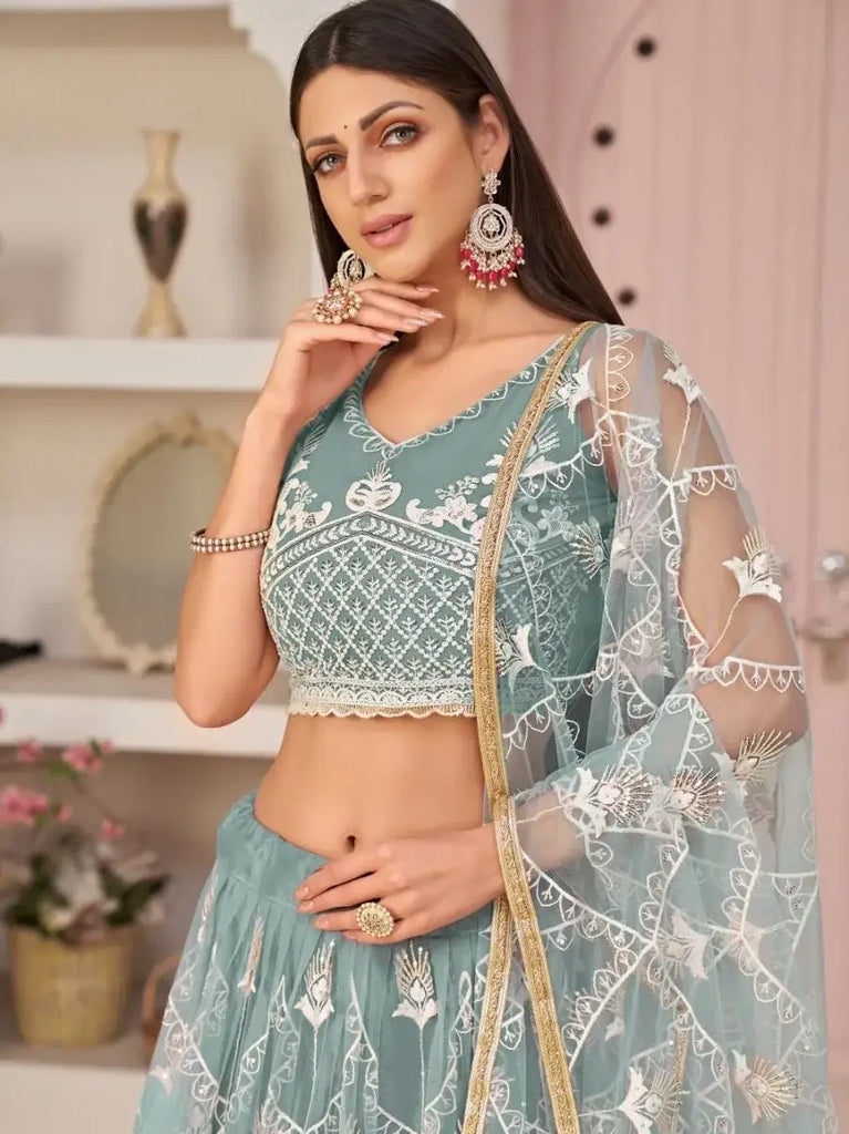Attractive Sea-Blue Thread Embroidered Net Lehenga Choli