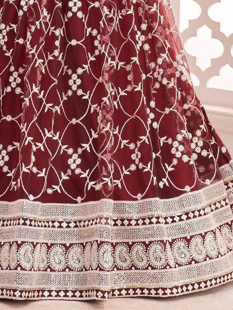 Maroon lehenga with white floral embroidery and detailed border, ethnic Indian wear