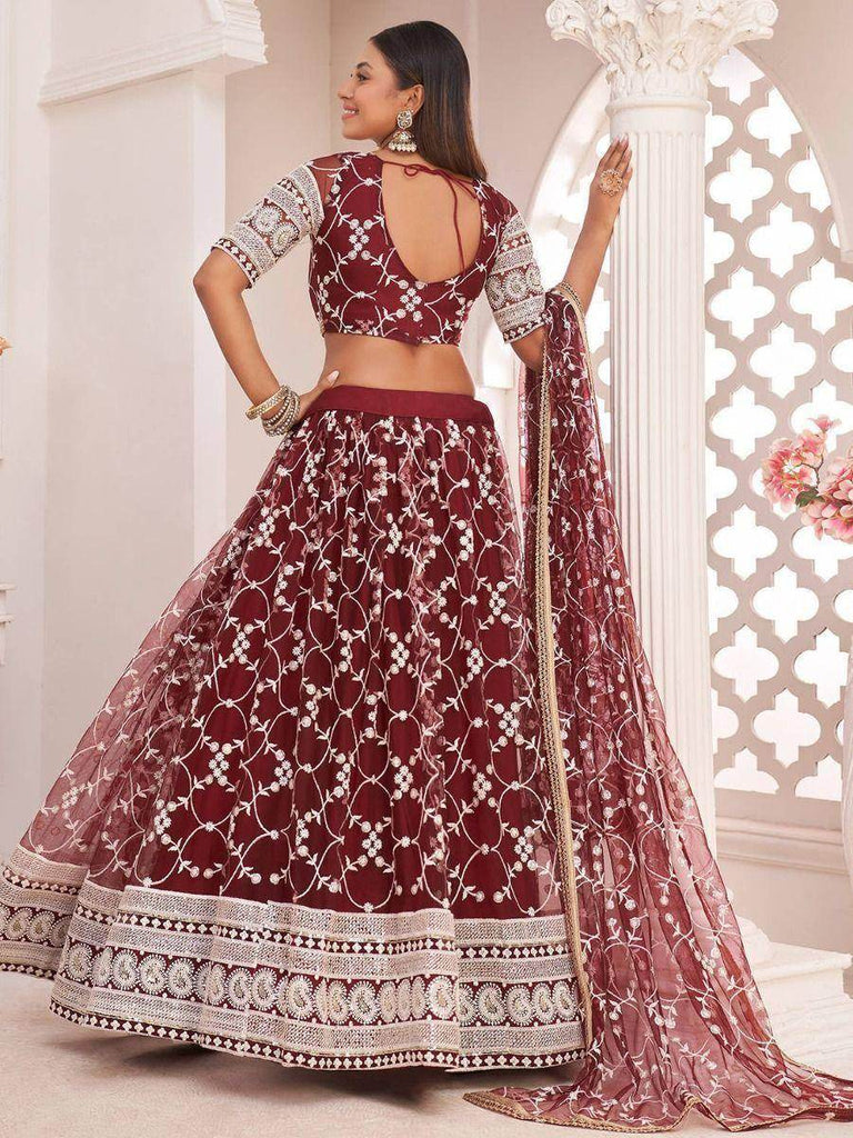 Luxurious Maroon Butterfly Net Embroidered Reception Wear Lehenga Choli