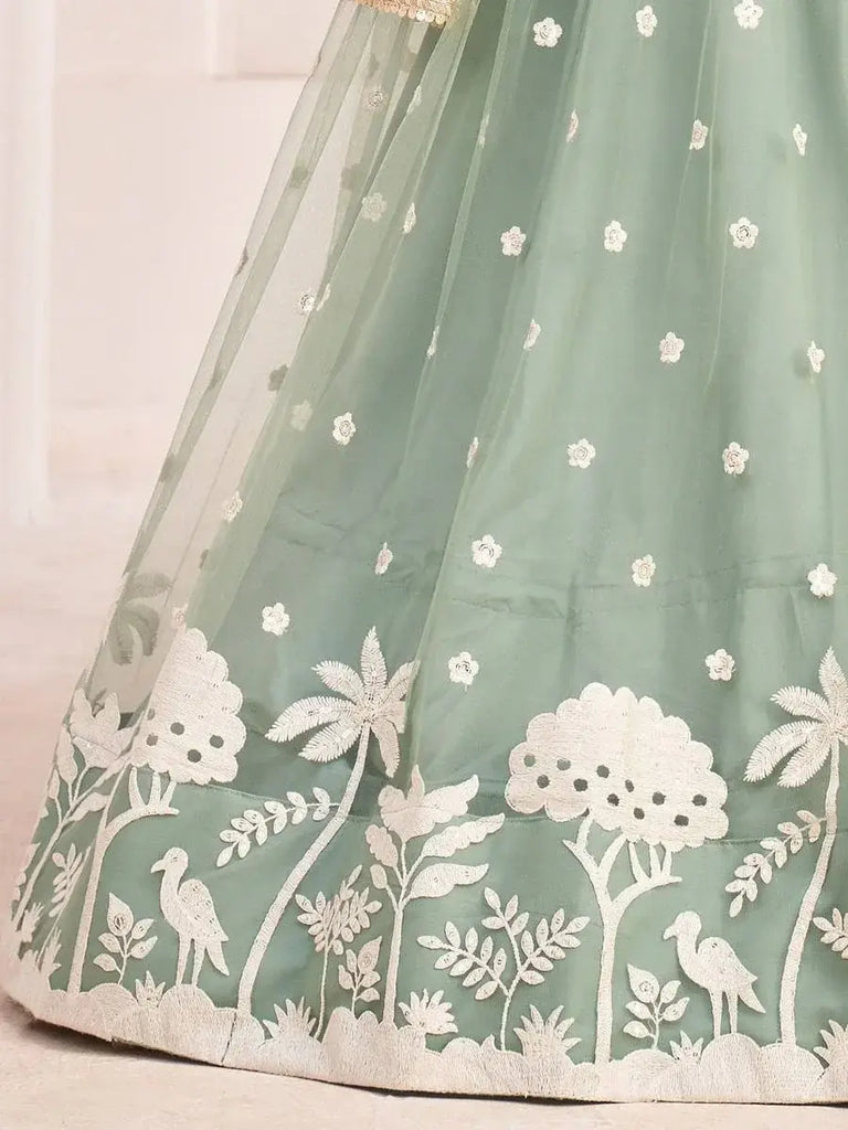 Ravishing Pista Green Butterfly Net White Cotton Thread Perfect Party Look Lehenga