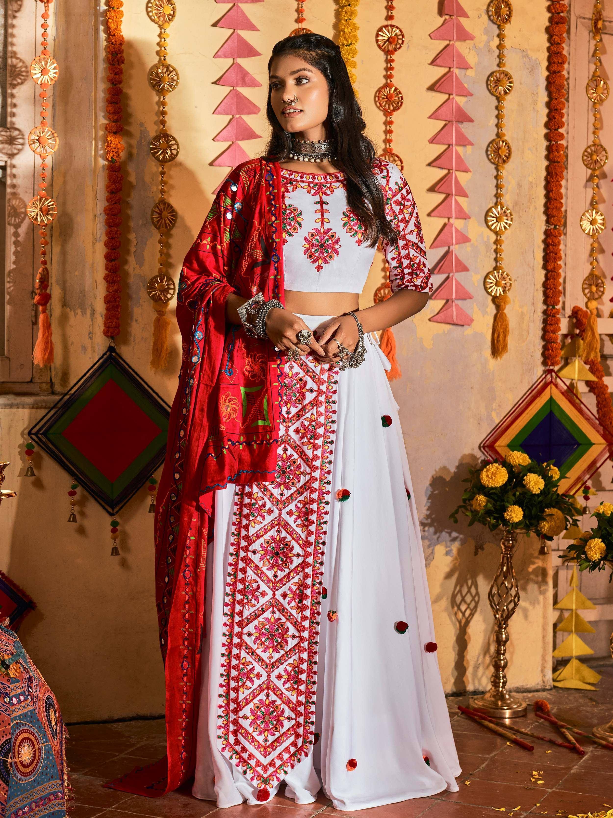White embroidered lehenga choli with red dupatta, festive Indian ethnic wear for celebrations