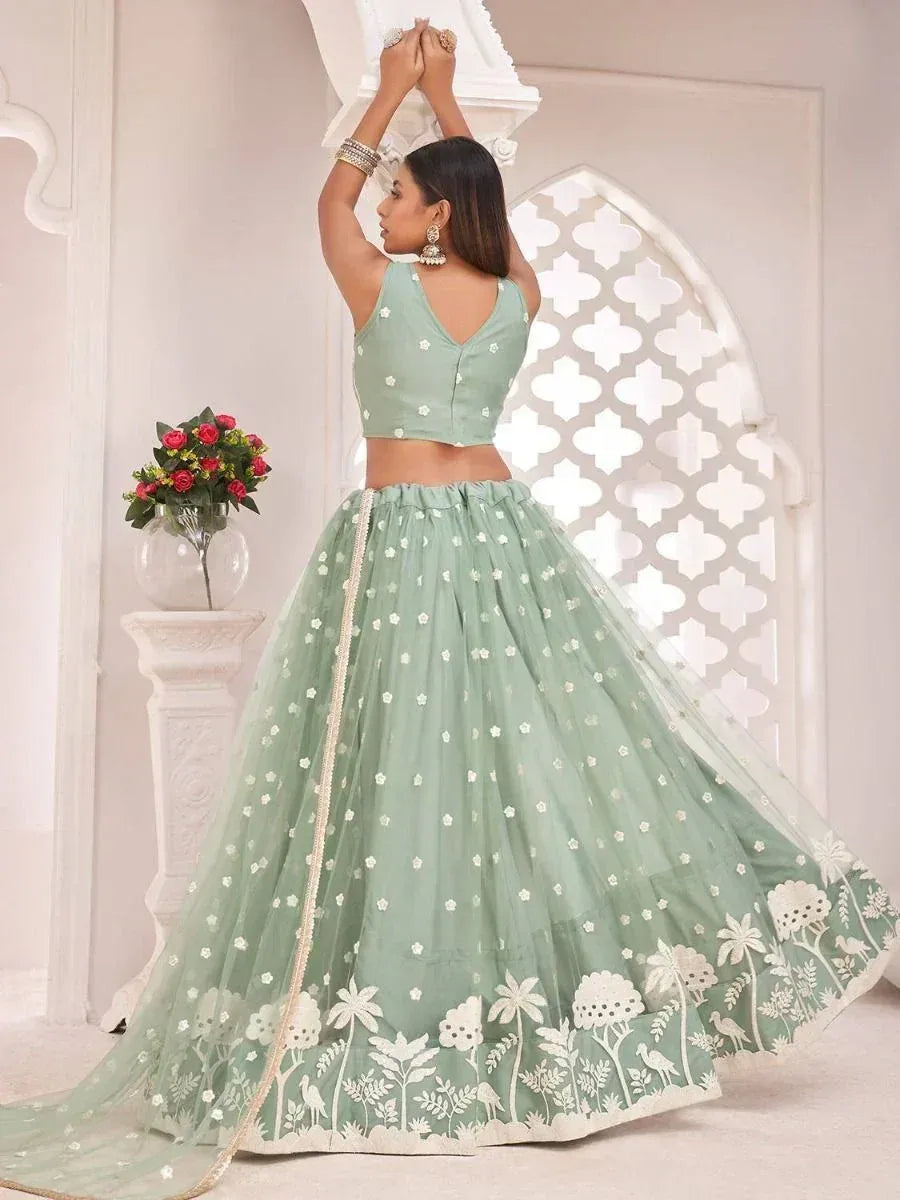 Mint green lehenga choli with floral embroidery, perfect for Indian ethnic wear and festive occasions.