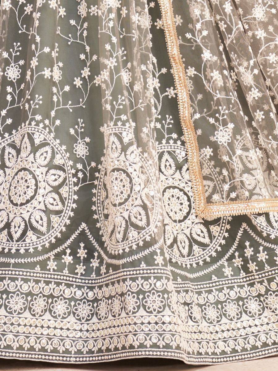Olive green lehenga with white floral embroidery and gold trim, ethnic Indian wear