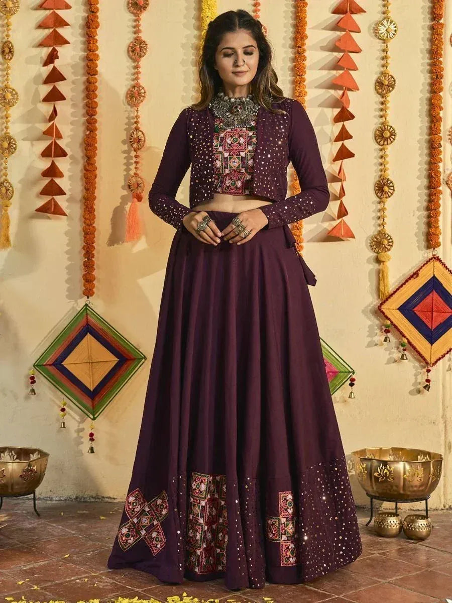 Purple ethnic lehenga choli with mirror work and embroidered panels, perfect for Indian festivals and weddings
