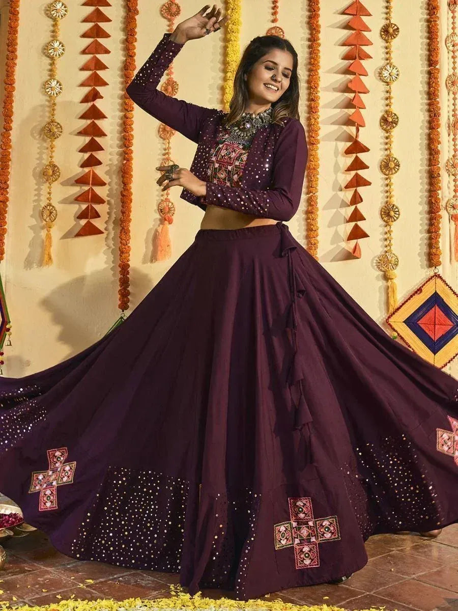 Purple embroidered lehenga choli with mirror work, perfect for Indian ethnic occasions and festive wear.