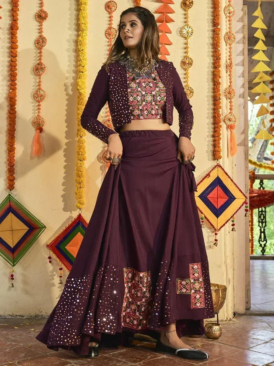 Purple ethnic lehenga choli with mirror work and embroidery, perfect for Indian festivals and weddings