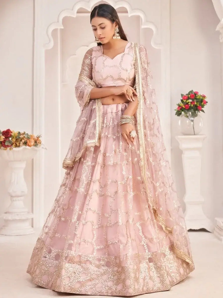 Prominent Pastel Pink Sequins Embroidery Net Lehenga Choli