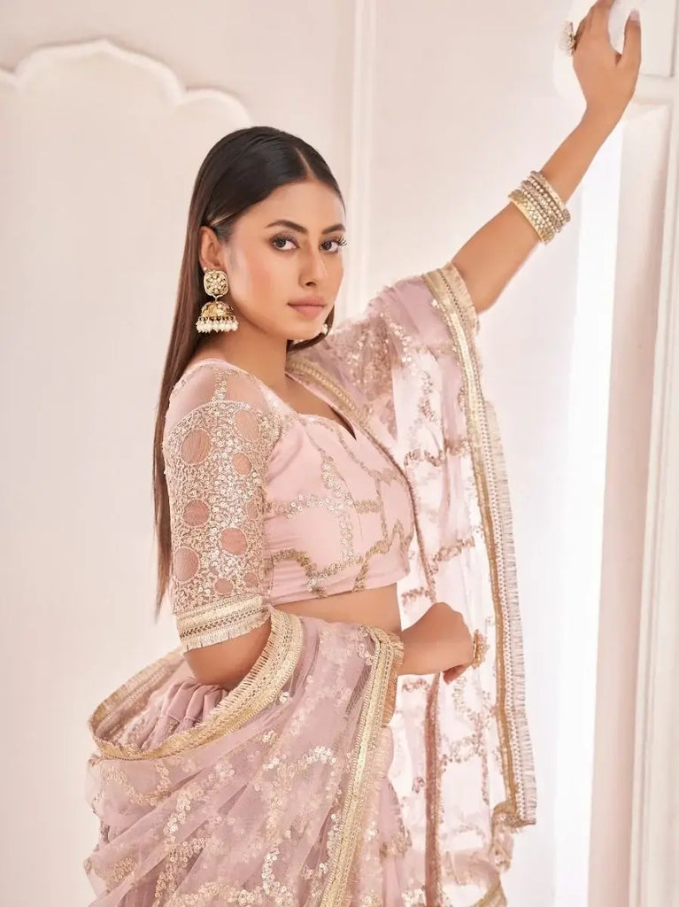 Prominent Pastel Pink Sequins Embroidery Net Lehenga Choli