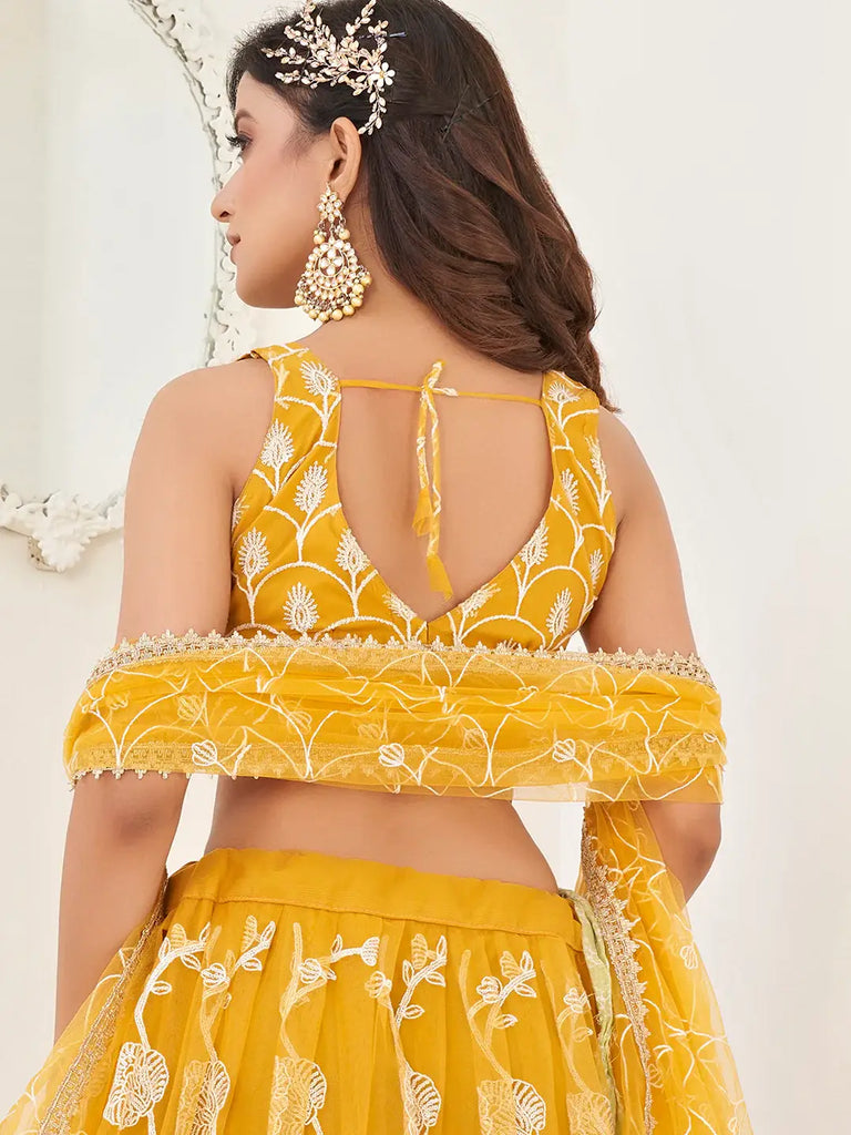 Appealing Mustard Yellow Embroidered Net Haldi Wear Lehenga Choli