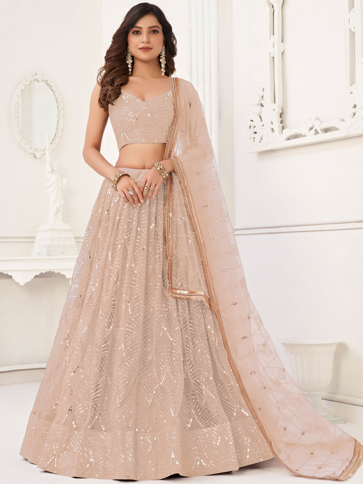 Captivating Beige Embroidered Net Engagement Wear Lehenga Choli 