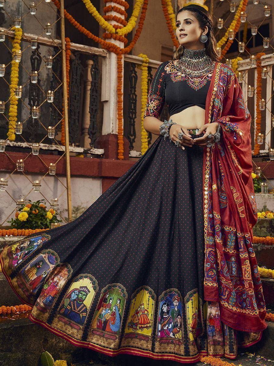 Black printed lehenga choli with colorful border and red dupatta, ethnic Indian wear for festive occasions