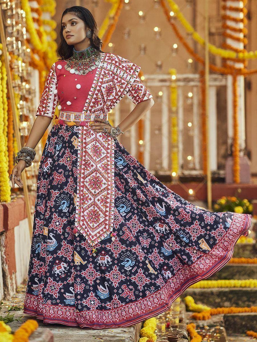 Woman in vibrant Indian ethnic lehenga choli with intricate prints, perfect for festive occasions