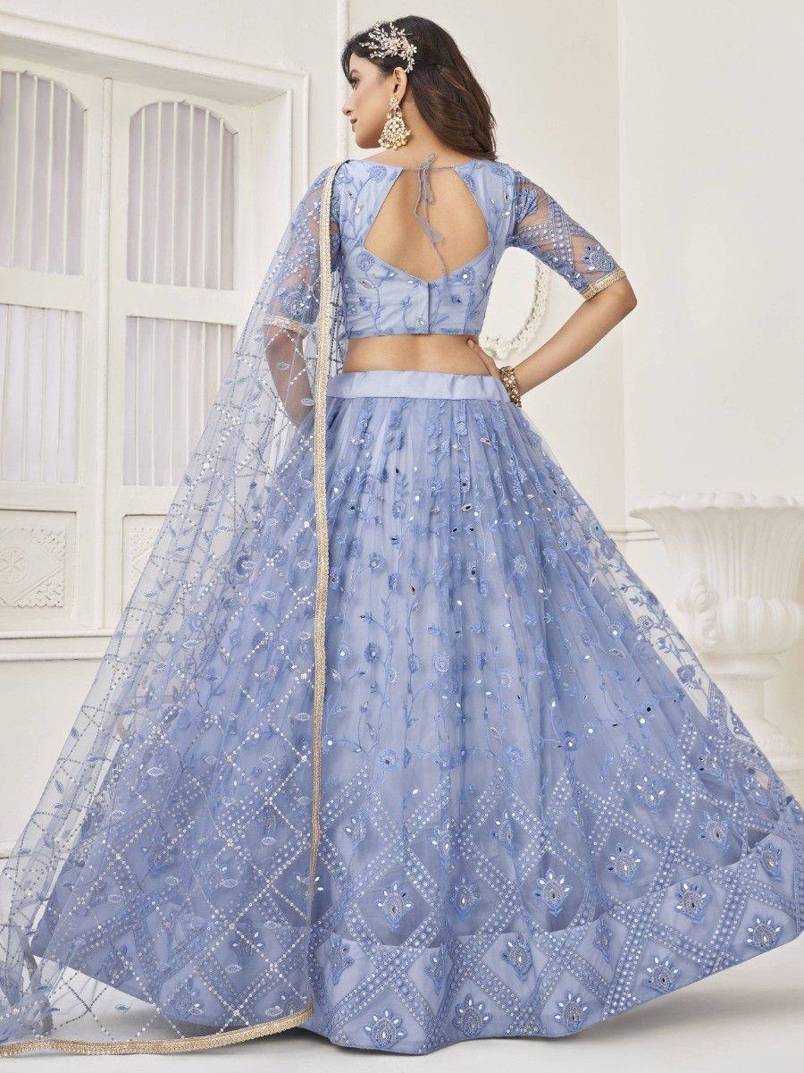 Light blue embroidered lehenga choli with sheer dupatta, perfect for Indian weddings and festive occasions.