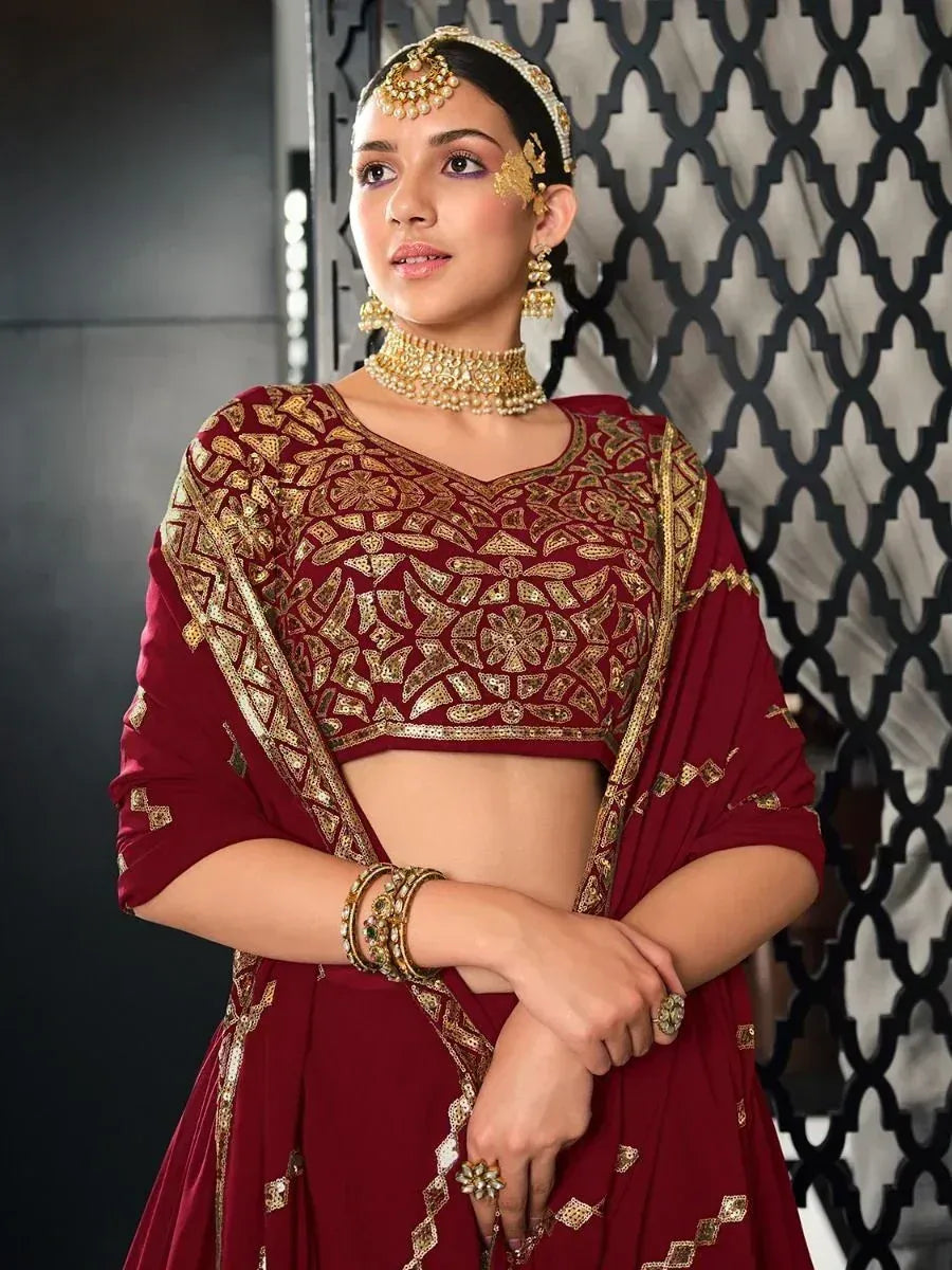 Maroon lehenga choli with gold embroidery, traditional Indian ethnic wear for weddings and festivals