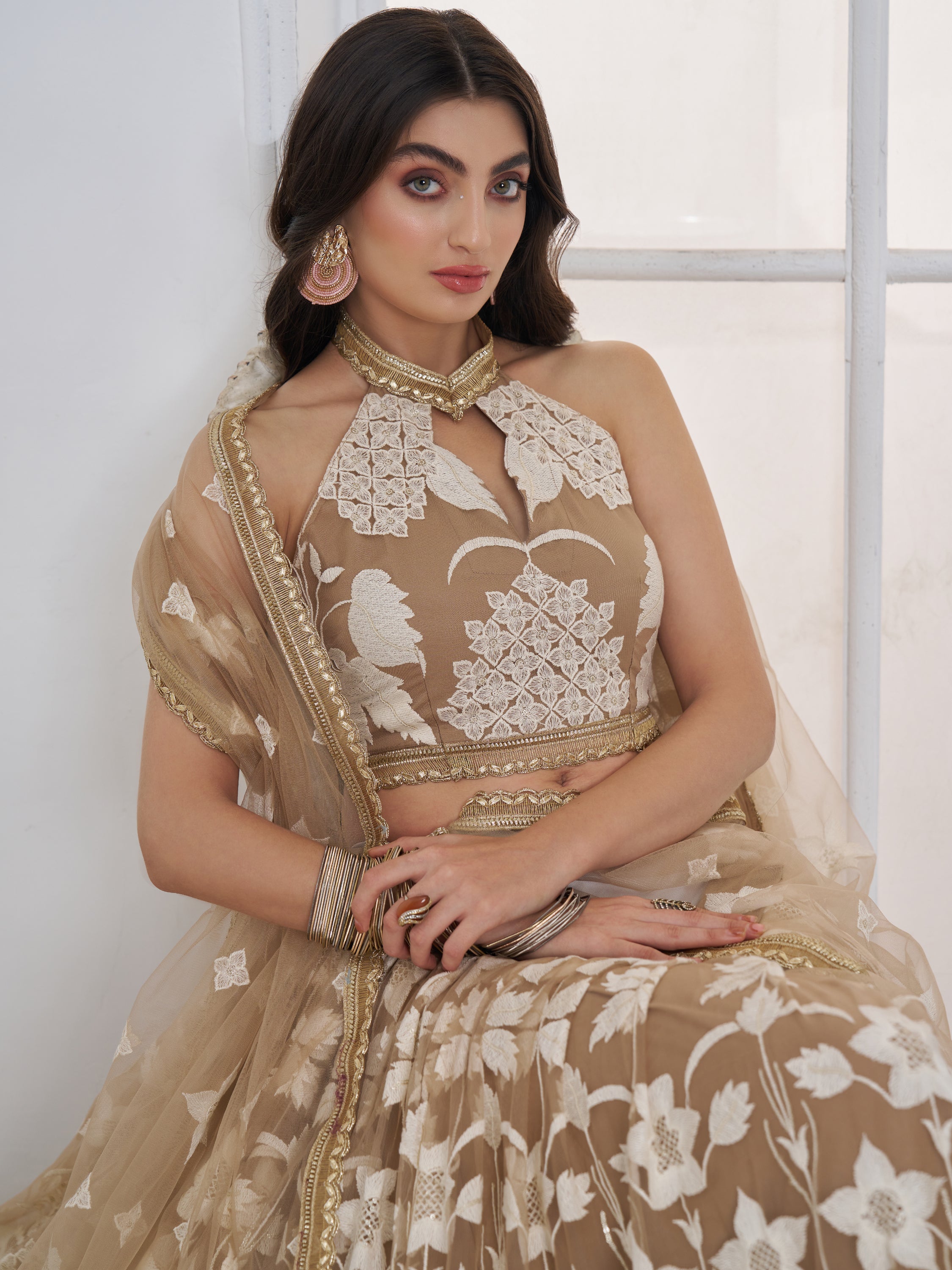 Dazzling Beige Embroidered Net Marriage Wear Lehenga With Blouse