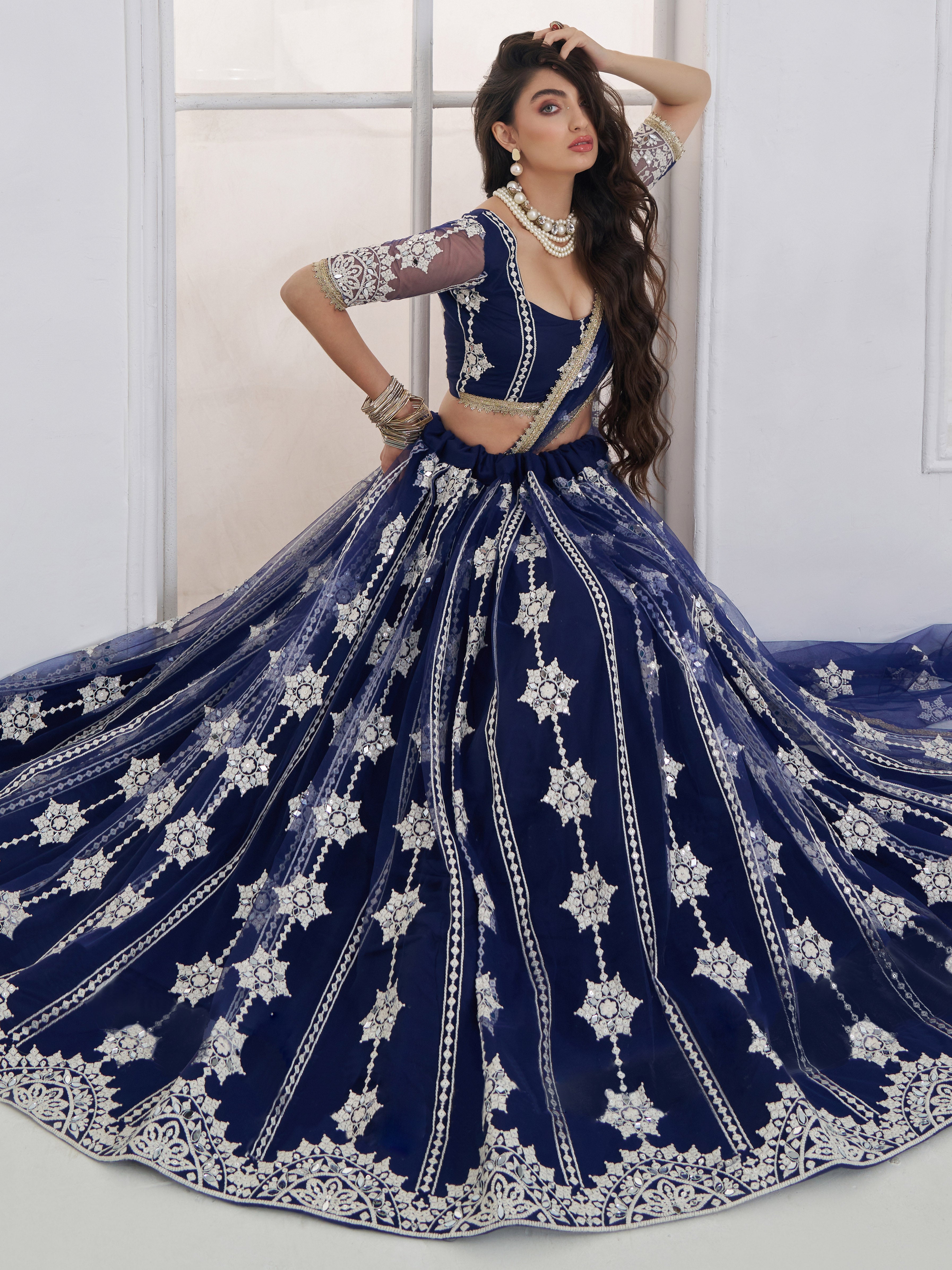Charming Navy Blue Thread Embroidery Net Wedding Wear Lehenga Choli