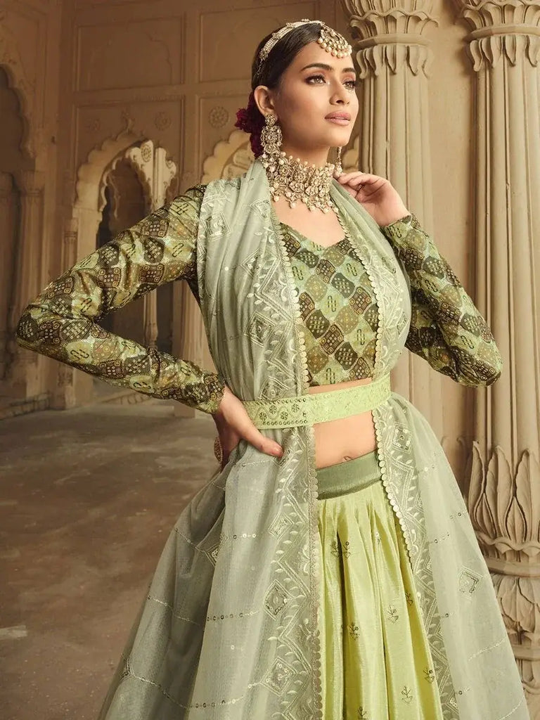 Outstanding Pista Green Shaded Sequins Lehenga With Embroidered Choli