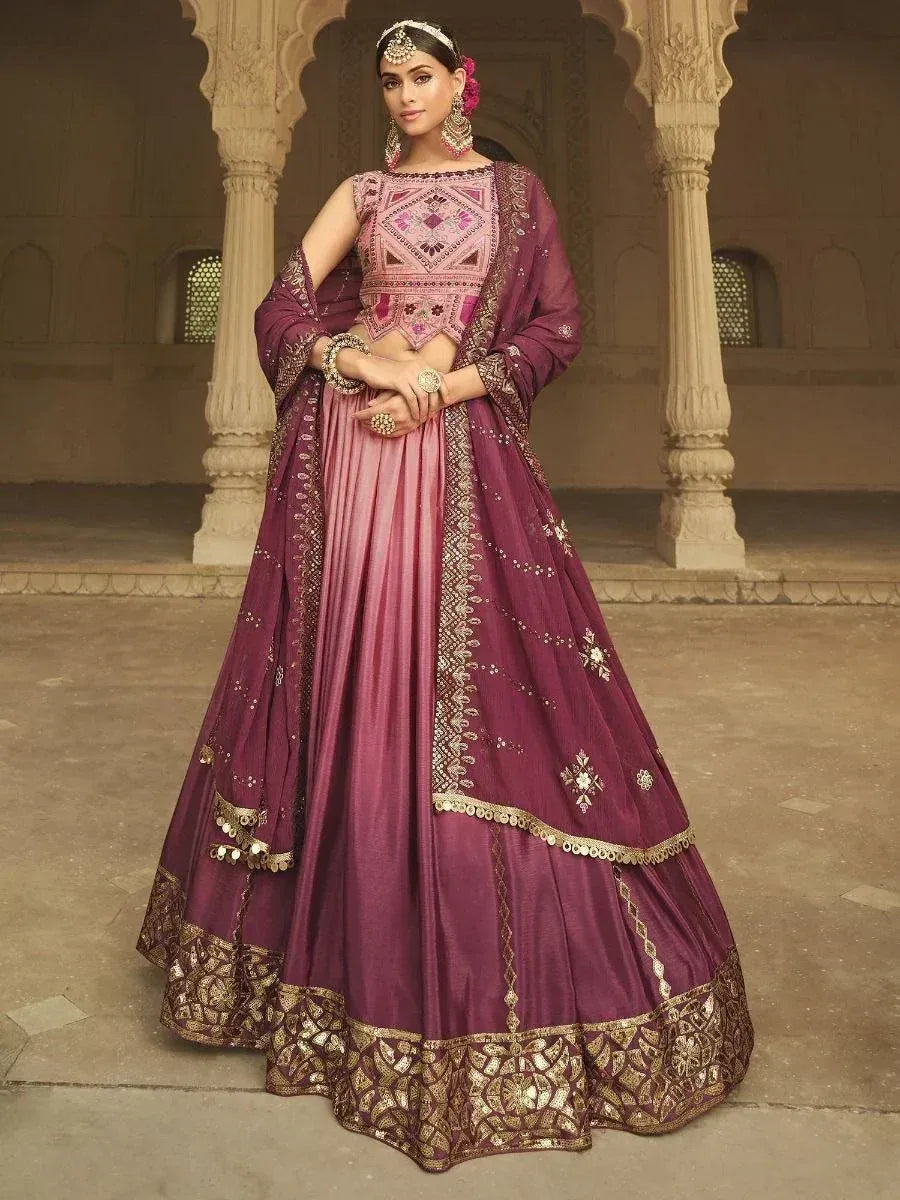 Elegant purple lehenga choli with gold embroidery, perfect for Indian weddings and festive occasions.