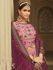 Fascinating Magenta Embroidered Silk Reception Wear Lehenga Choli