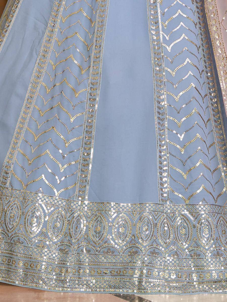 Light blue lehenga with gold sequin chevron and border embroidery, ethnic wear detail