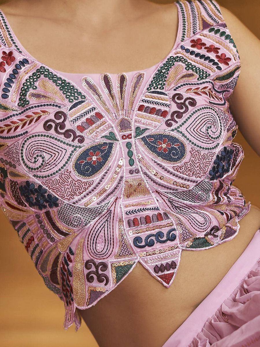 Pink embroidered lehenga choli blouse with intricate floral and paisley patterns, perfect for Indian ethnic wear.