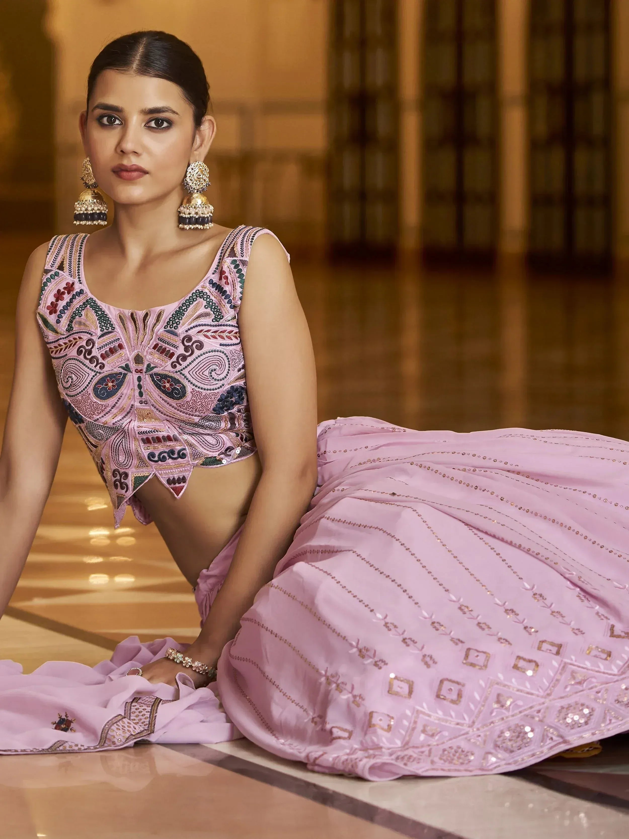 Pink embroidered lehenga choli with mirror work, perfect for Indian ethnic wear and festive occasions