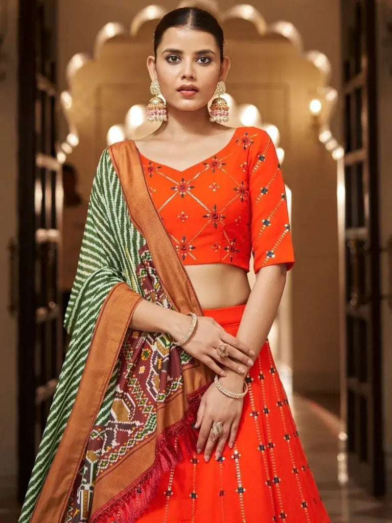 Appealing Orange Sequins Embroidery Georgette Lehenga Choli