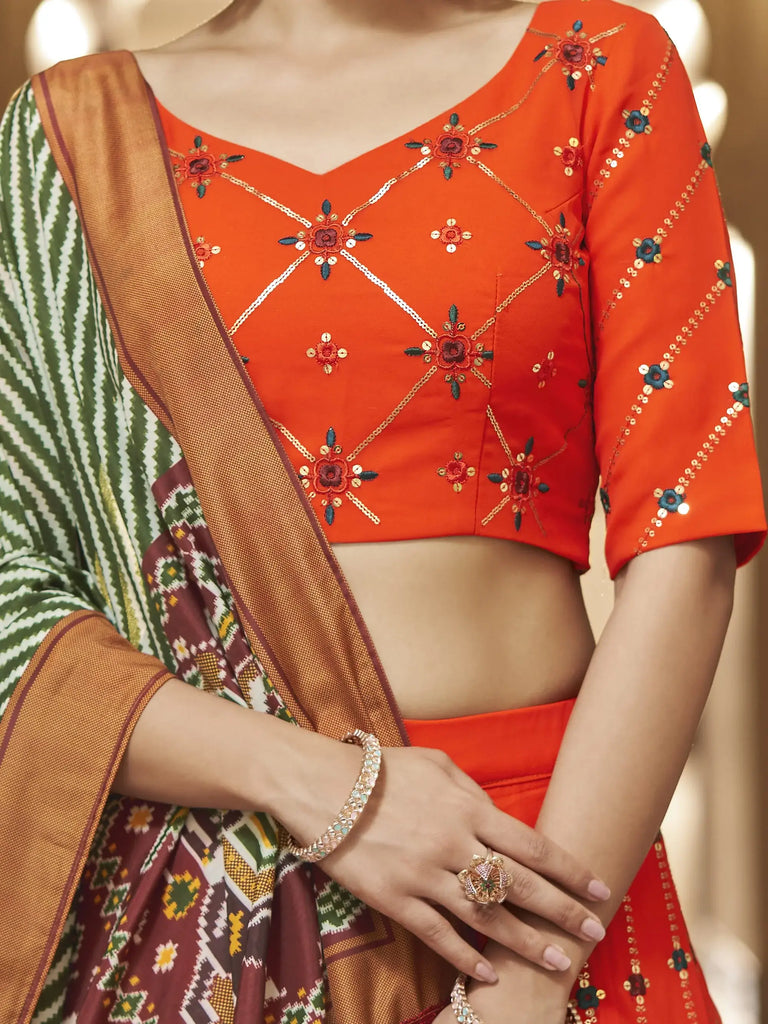 Appealing Orange Sequins Embroidery Georgette Lehenga Choli