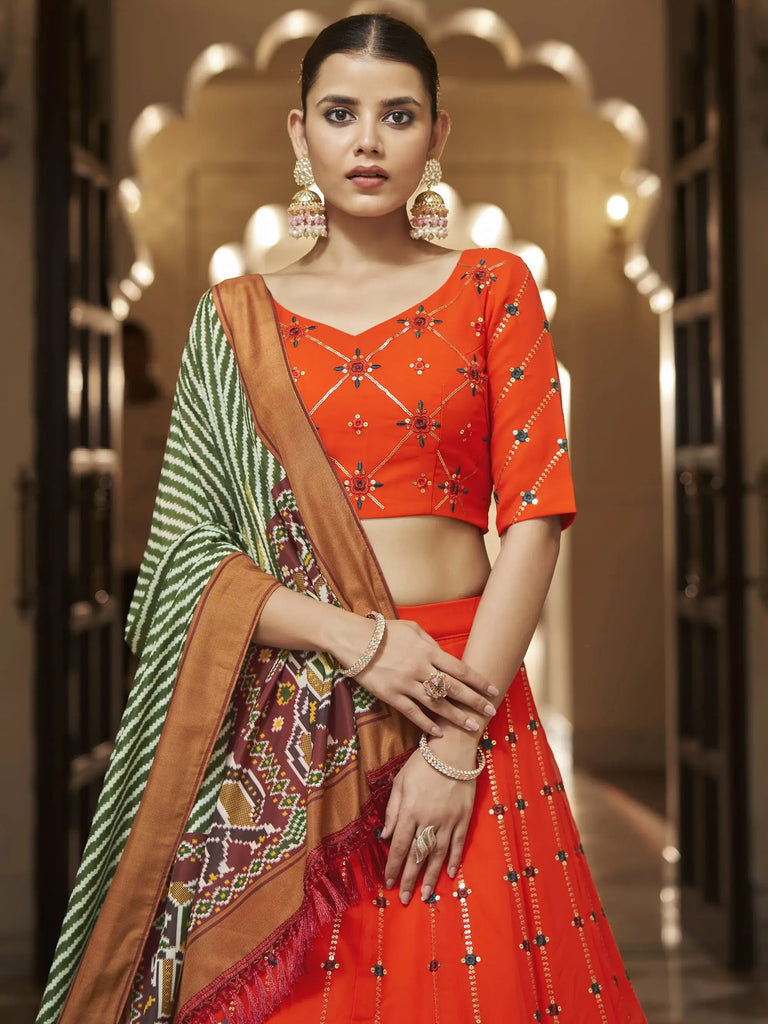 Appealing Orange Sequins Embroidery Georgette Lehenga Choli
