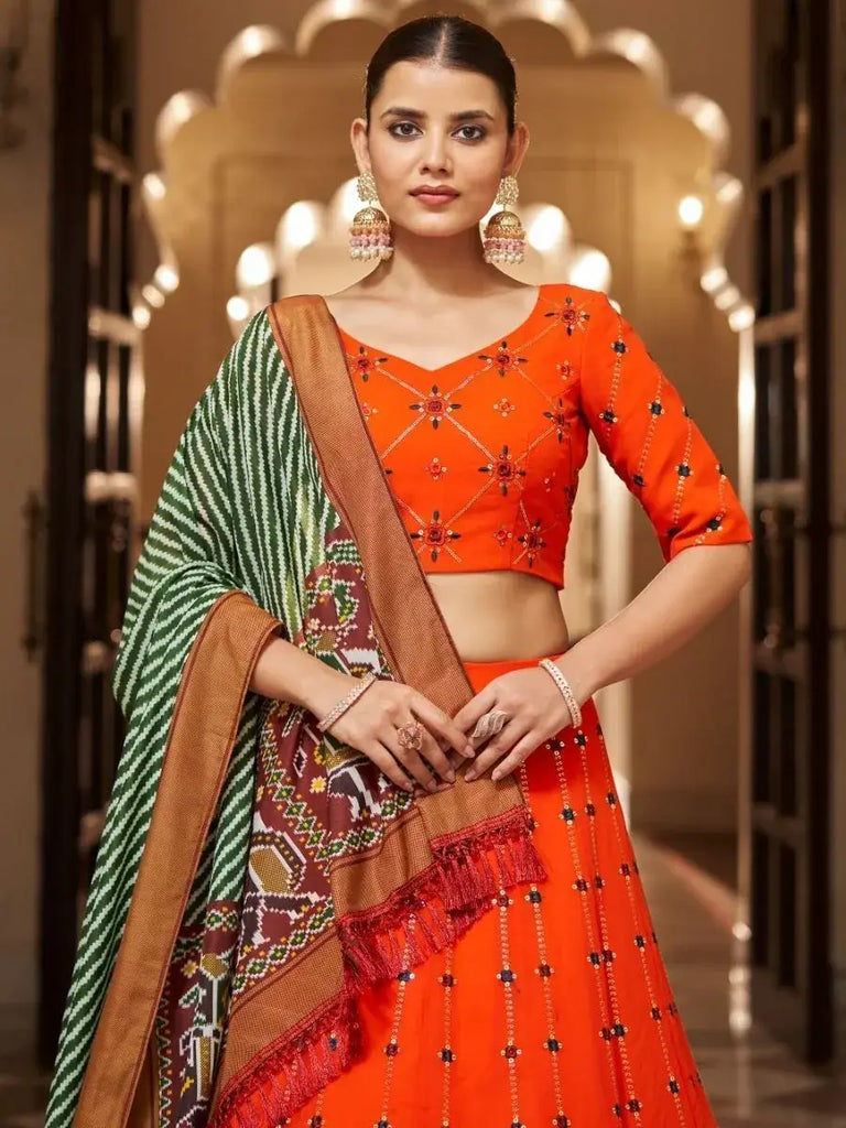Appealing Orange Sequins Embroidery Georgette Lehenga Choli