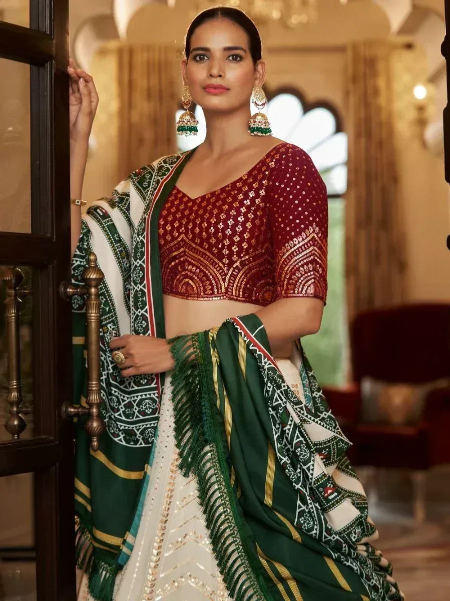 Elegant Indian ethnic saree with maroon sequin blouse and green-white printed pallu, perfect for weddings and festivals