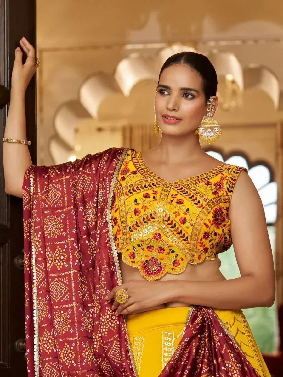 Yellow embroidered lehenga choli with maroon dupatta, Indian ethnic wear for women