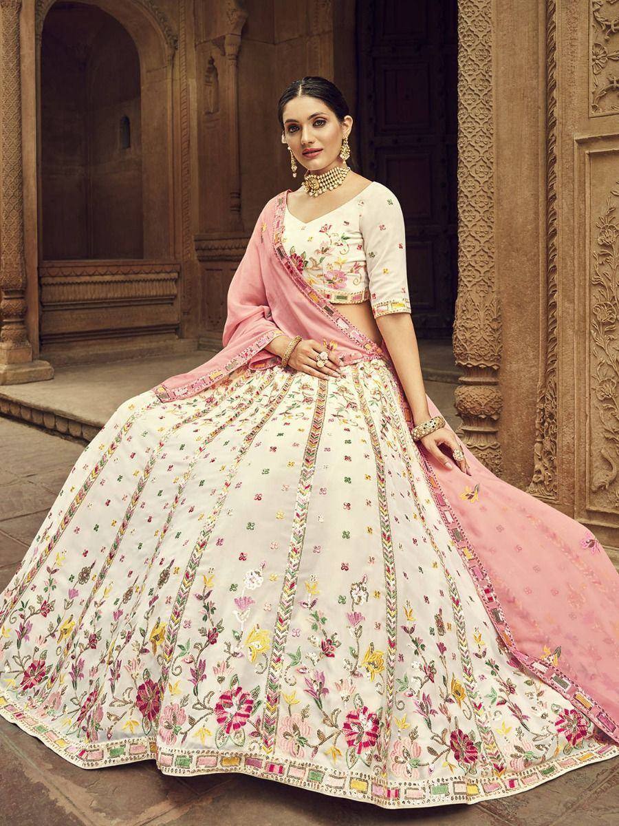 Elegant floral embroidered lehenga choli with pink dupatta, perfect for Indian weddings and festive occasions.