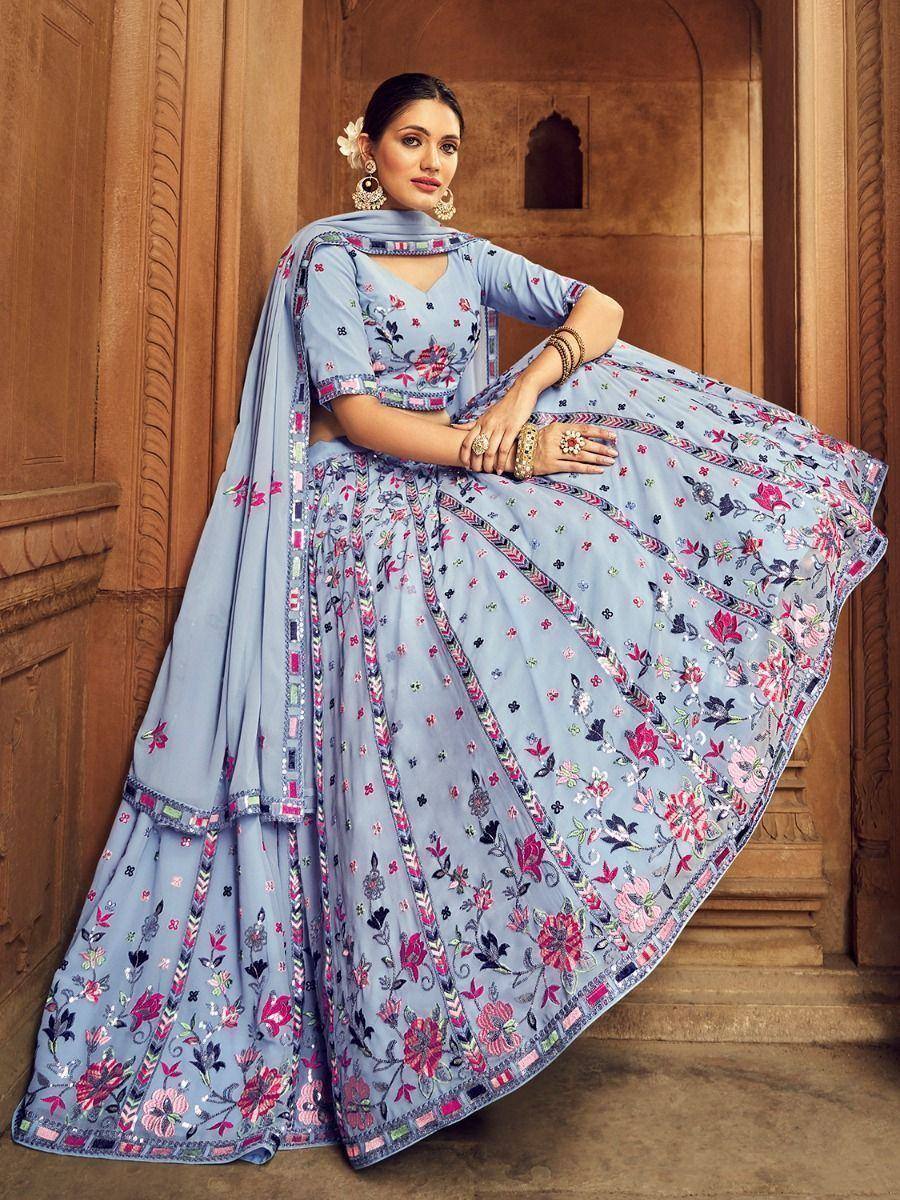 Light blue embroidered lehenga choli with floral motifs, perfect for Indian ethnic occasions