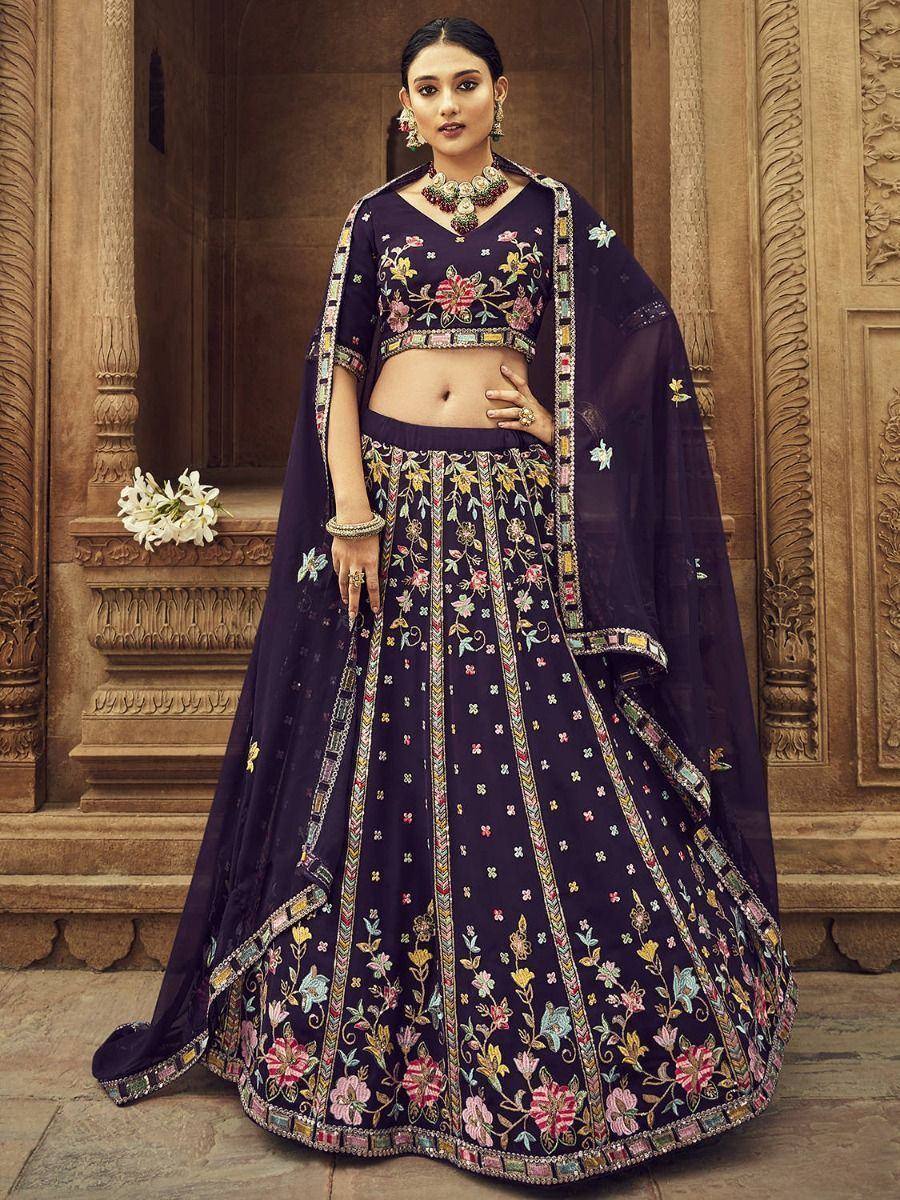 Elegant purple floral embroidered lehenga choli with matching dupatta, perfect for Indian weddings and festive occasions.